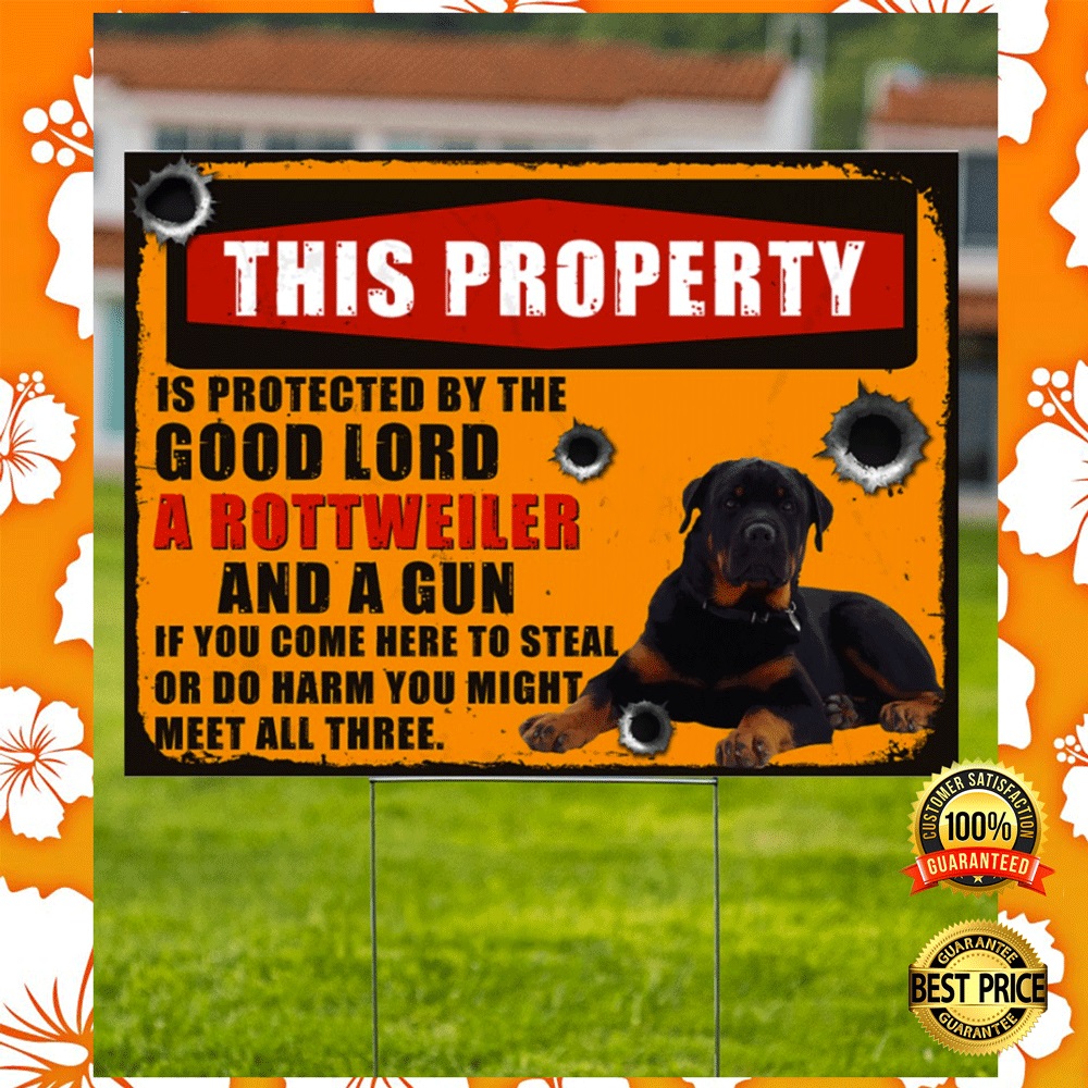 This property is protected by the good lord a rottweiler and a gun yard sign2